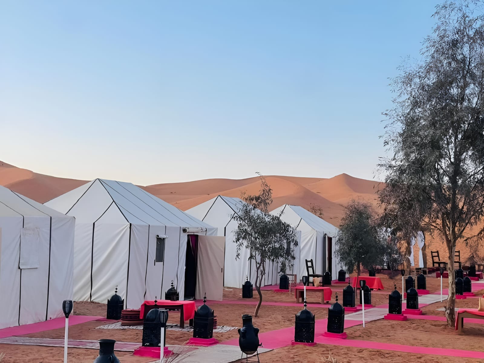Luxury desert camp in Merzouga with traditional Berber tents