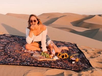 Enjoying-our-picnic-at-sunset.-1024x715