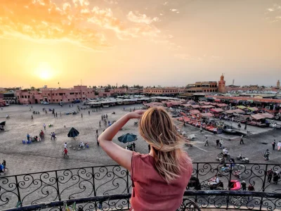a woman looking at a city